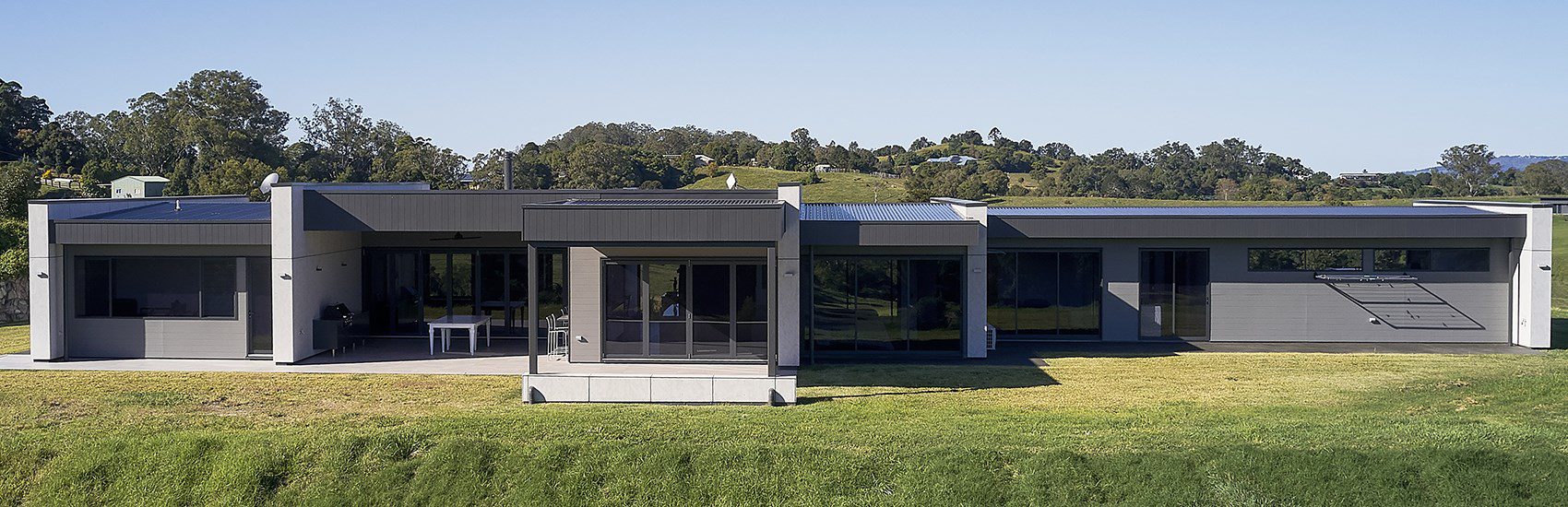 Stud farm home enhanced with Barestone and Edge