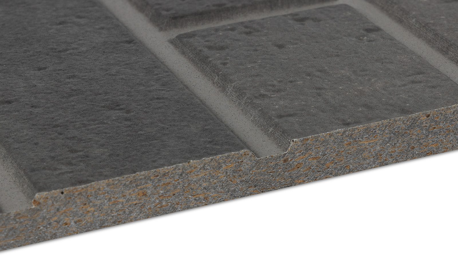 A close-up view of a grey rectangular tile with a slightly rough texture, featuring a beveled edge. The tile's surface has a subtle pattern that mimics the appearance of natural stone.