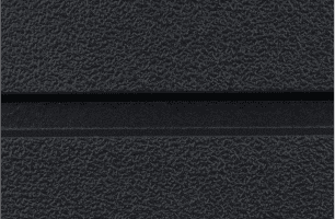 Close-up of a textured, dark gray surface with a black horizontal groove running across the middle. The surface features a slightly rough, pebbled pattern.